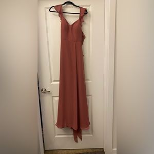 Azazie Everett in the color desert rose, fits a size 2/4.